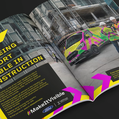 Open magazine spread showing construction workers standing beside a brightly patterned Ford van at a building site, promoting the Make It Visible safety campaign.