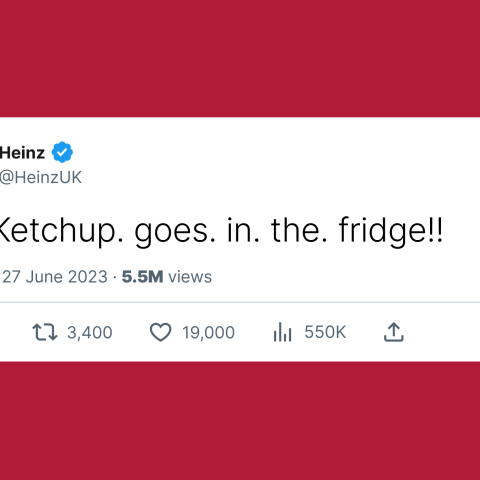 Heinz UK tweet reading ‘FYI: Ketchup. goes. in. the. fridge!!’ displayed on a red background.