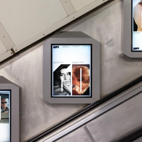 Digital poster displays on an escalator promoting the Chicago International Film Festival’s 60th anniversary.