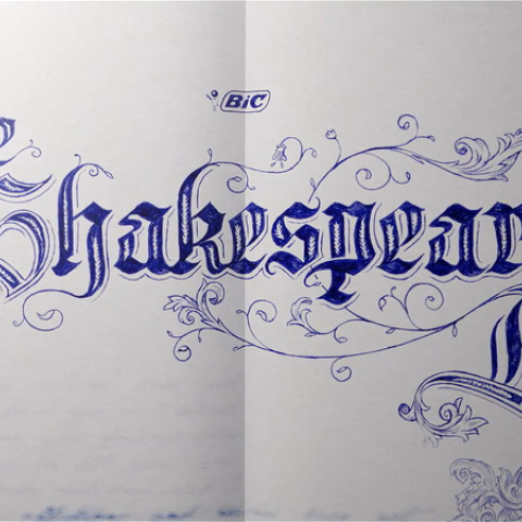 The Shakespeare BIC written out in a blue ink in a script style 