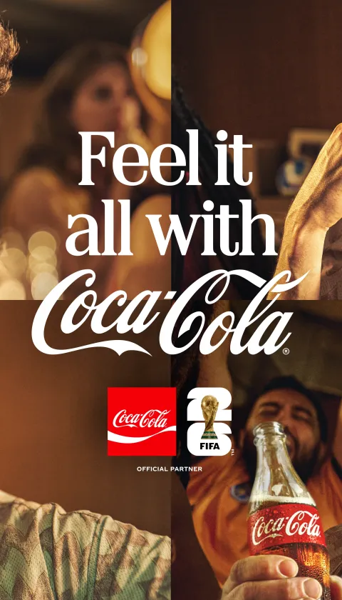 "A Coca-Cola FIFA World Cup campaign image featuring a young male football fan in four expressive portraits, each capturing a different emotion — anxious tension, frustrated shouting, wide-eyed disbelief, and euphoric celebration holding a Coca-Cola bottle among a crowd. All shots are set in a warm, dimly lit bar or living room setting. Centre text reads 'Feel it all with Coca-Cola', alongside the Coca-Cola and FIFA Official Partner logos."