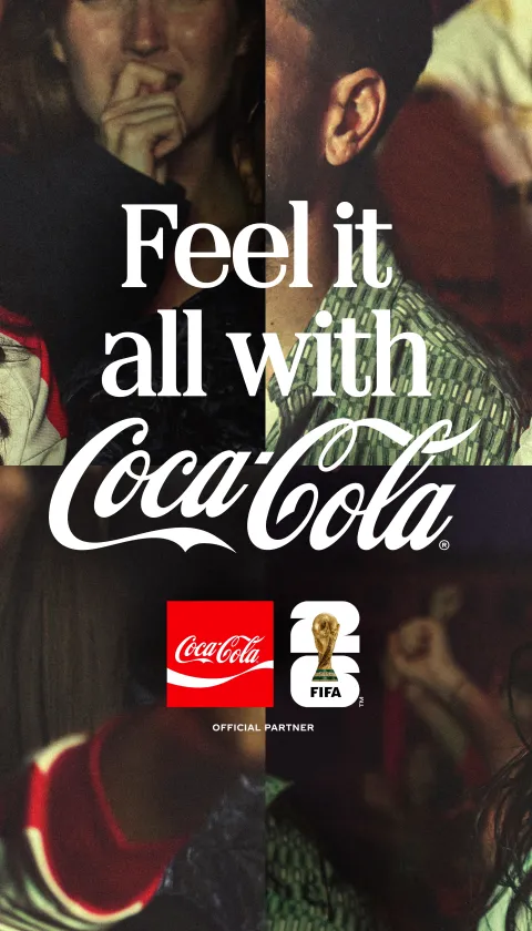 "A Coca-Cola FIFA World Cup campaign image featuring two female football fans in four expressive portraits, each capturing a different emotion — wide-eyed shock, tearful anguish, open-mouthed disbelief, and passionate screaming in celebration. All shots are set in a lively, dimly lit crowd setting, with both women wearing red and white football shirts. Centre text reads 'Feel it all with Coca-Cola', alongside the Coca-Cola and FIFA Official Partner logos."